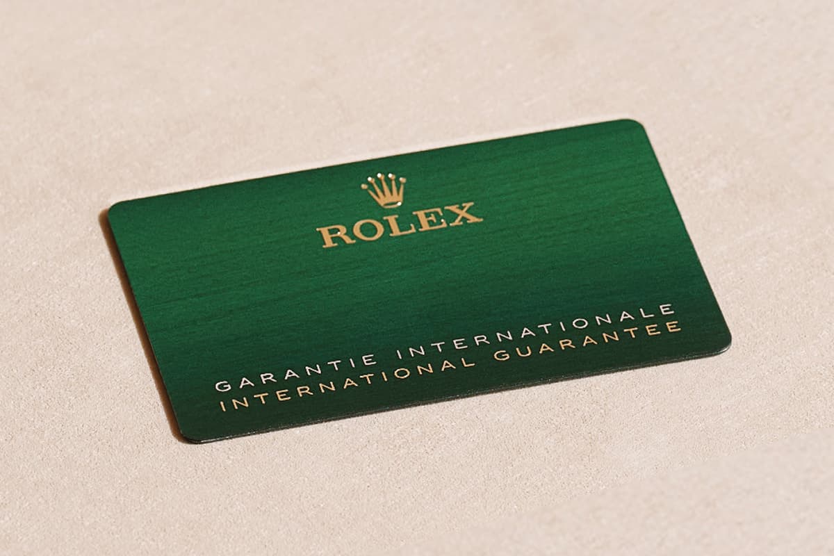 Rolex International Guarantee card in green leather holder